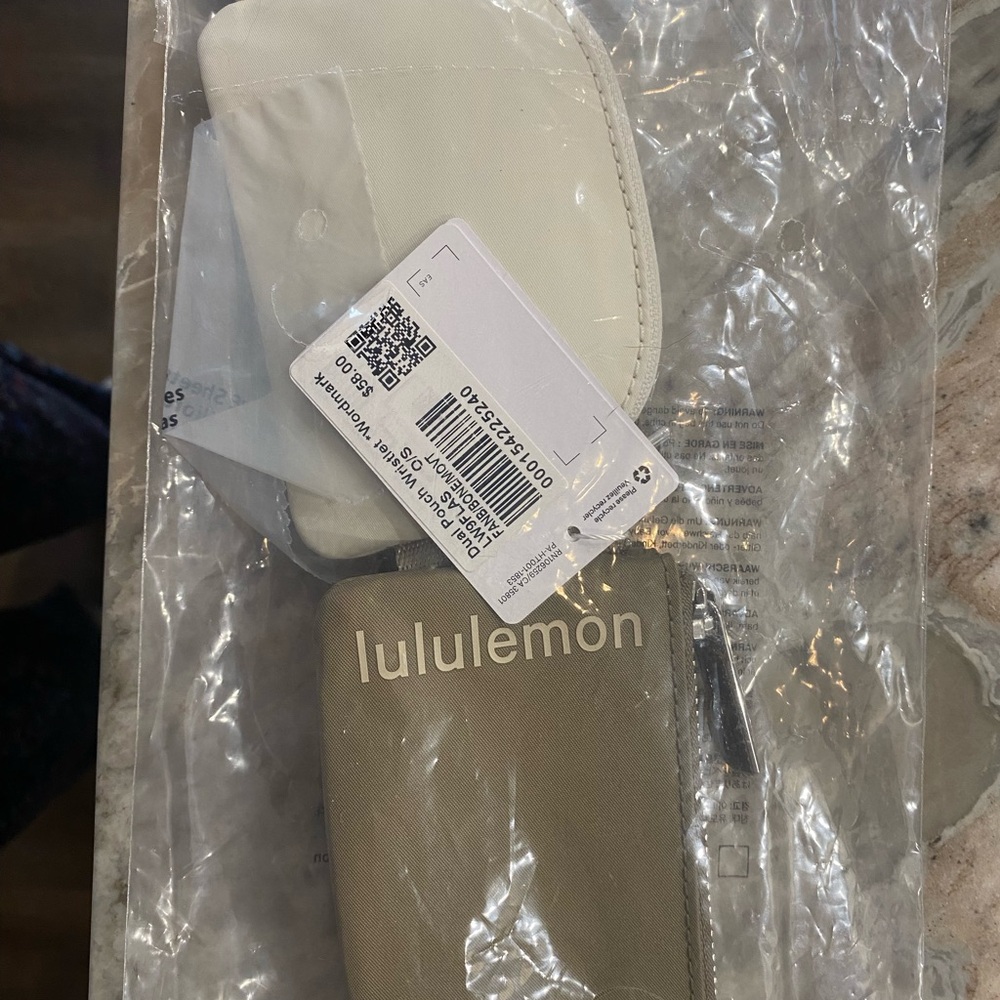 Lululemon White and Tan Pouch Set new in package. Never opened.